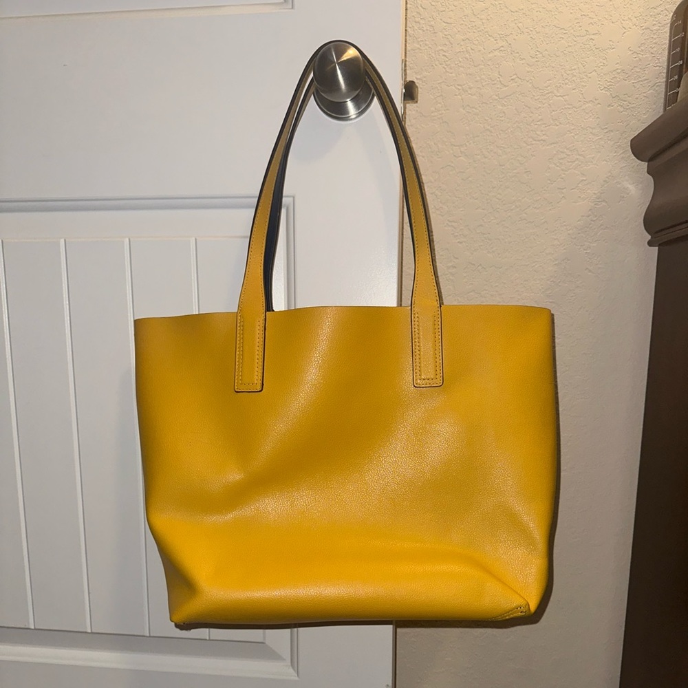Used reversible, large tote. Yellow and Navy Floral